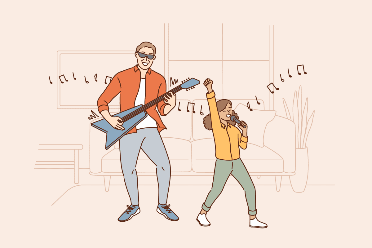 Cheerful father and young daughter singing