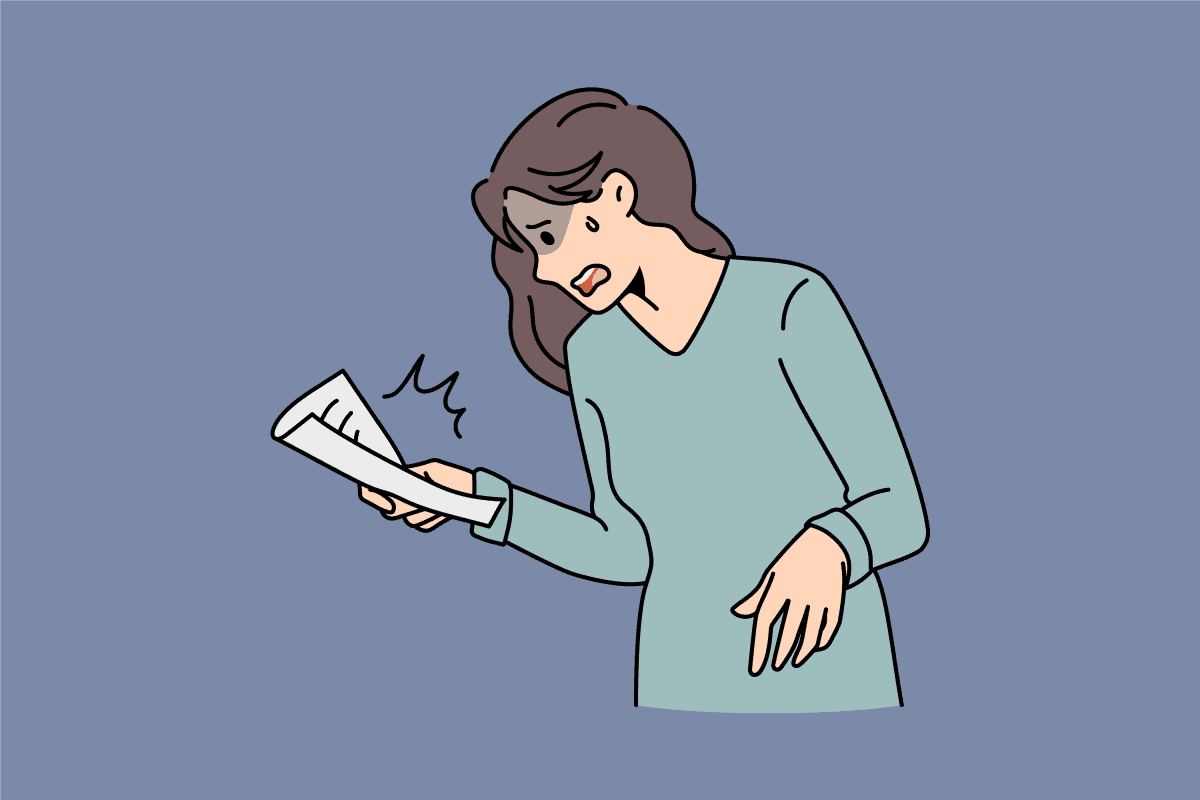 Stressed woman holding defective marriage certificate