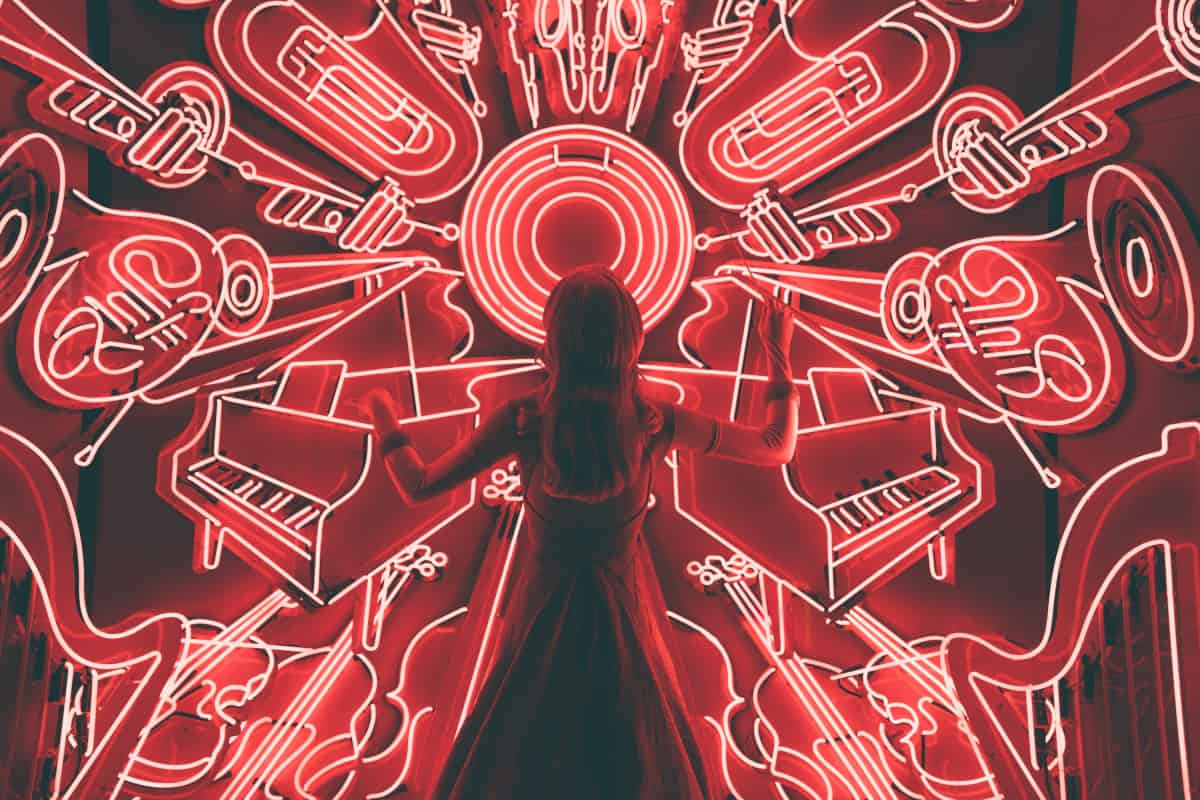 Woman Conducting Neon Orchestra